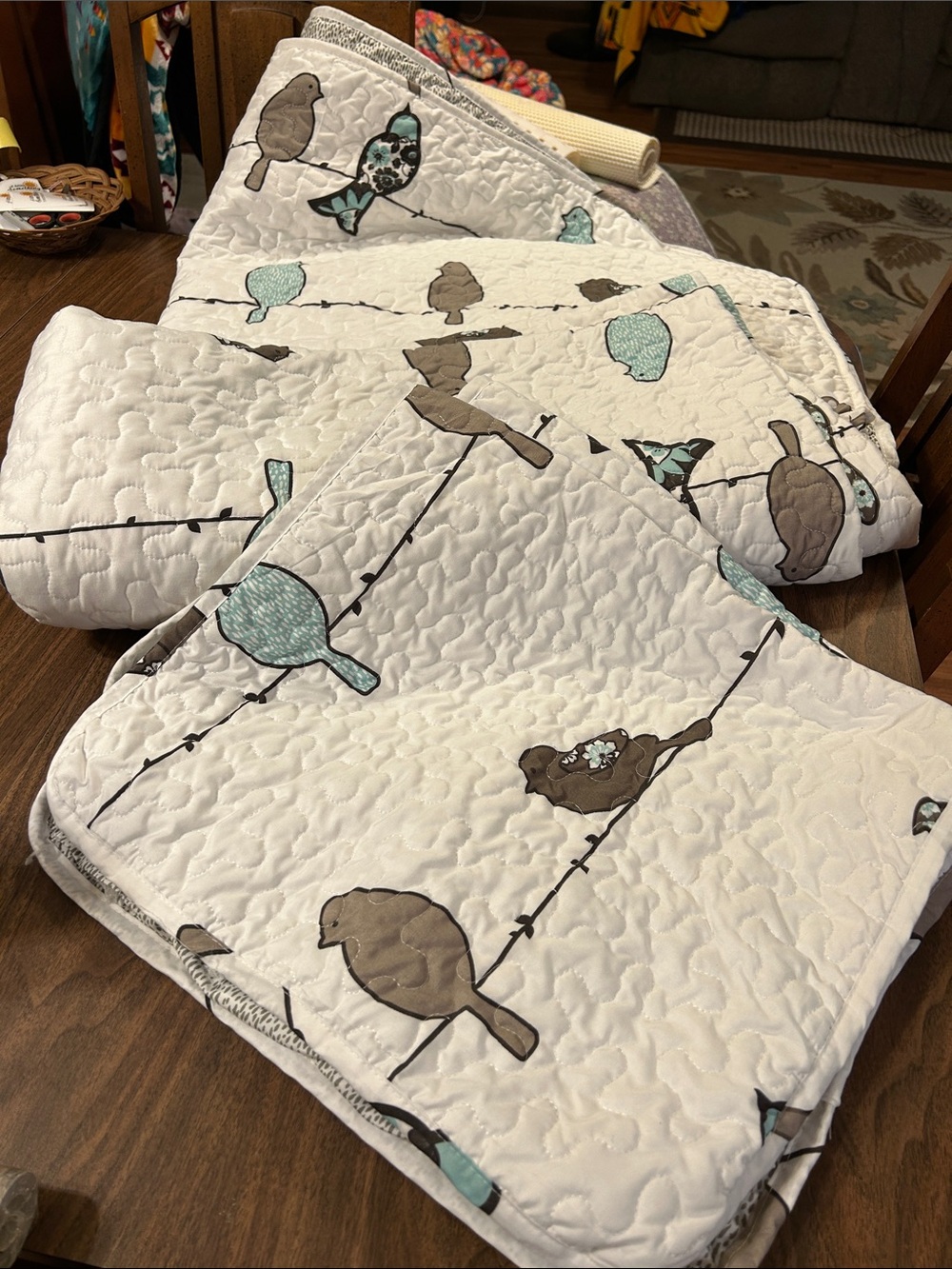 White Quilted Bird-Print Quilt with Teal and Brown Accents